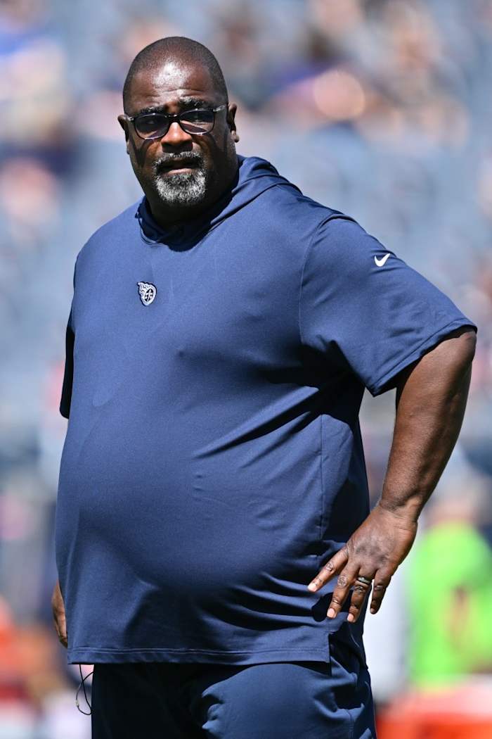 Tennessee Titans Assistant Head Coach Terrell Williams watches his team warm up before a game against the Chicago Bears at Soldier Field.